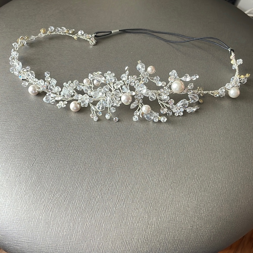 Beautiful bridal head piece by Maritzas Bridal Veil Inc.